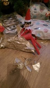 Elf on The Shelf Unwrapping Presents